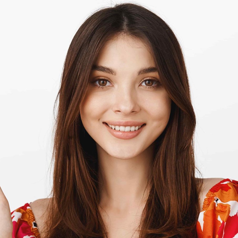 smiling-brunette-girl-waving-hand-say-hi-wearing-summer-floral-dress-standing-white-background (1)